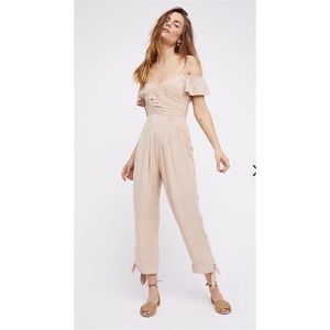 I’m the moment Free people jumpsuit